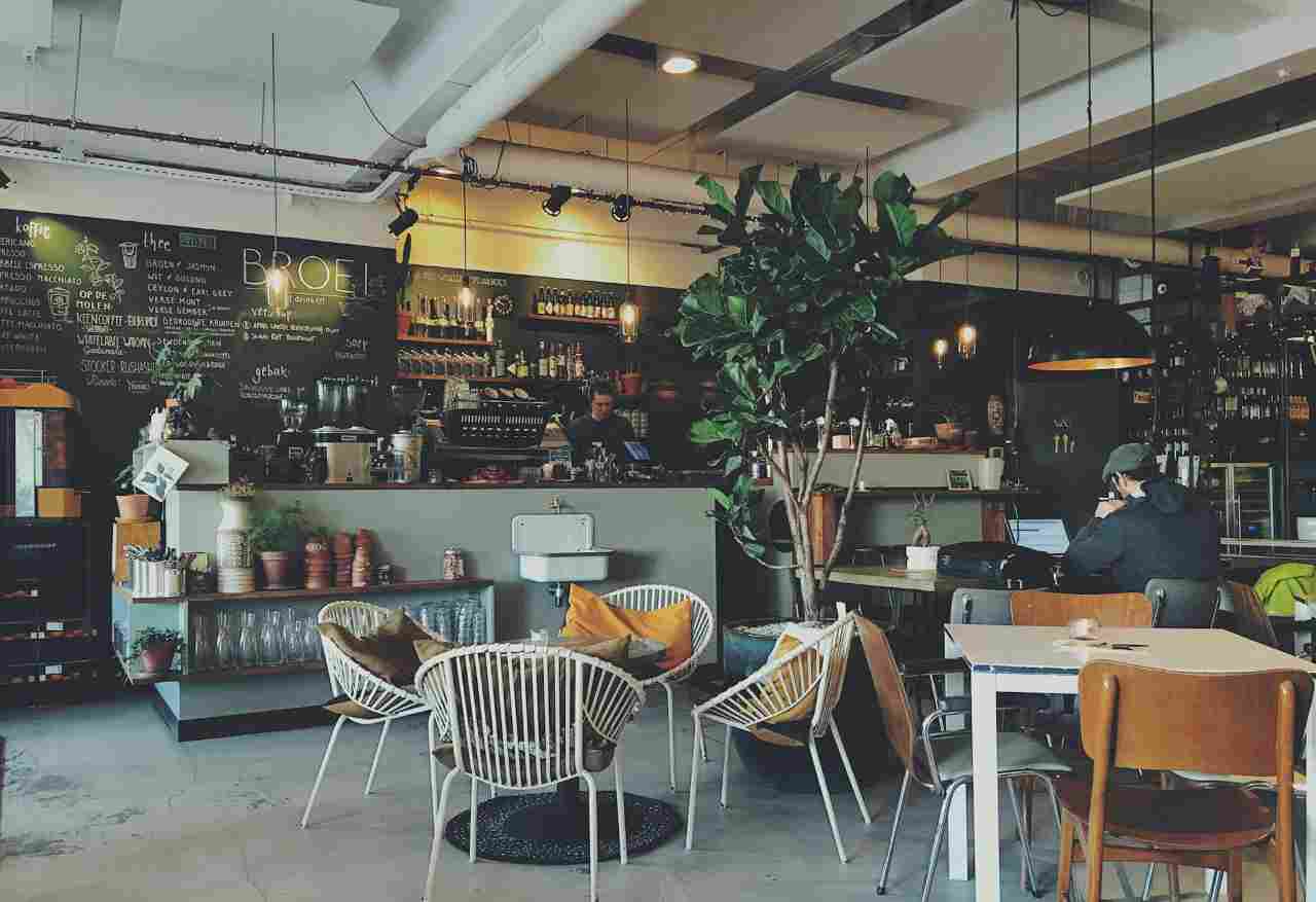 empty modern cafe with one customer
