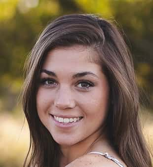 brown hair girl with a smile